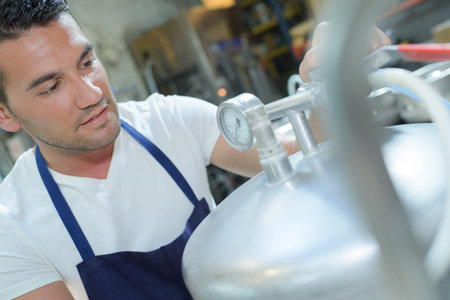 manufacturer dealing with kegs in brewery