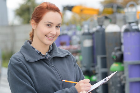 female warehouse worker conducts product registration