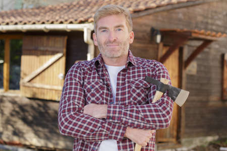 man holding an ax posingの写真素材