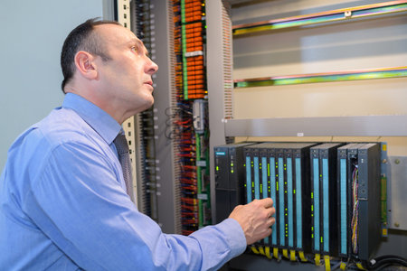 computer technician connecting cables