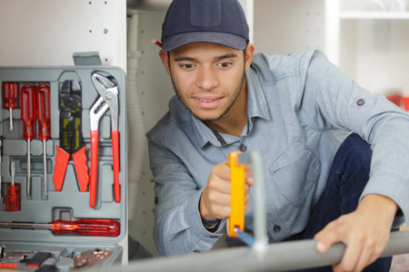 a young man worker with tools