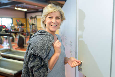 happy woman getting after gym tripの写真素材