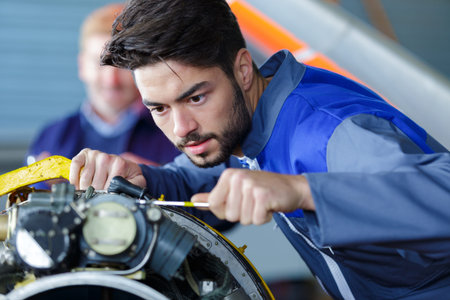 mechanic listening engine to find failure