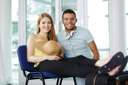 portrait of couple going on holidays