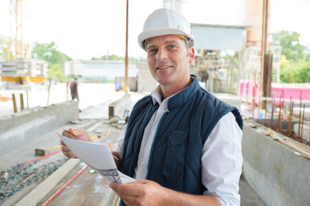 a smiling engineer is outside