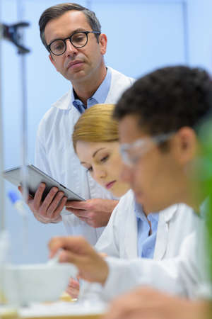 portrait of laboratory students and teacherの写真素材