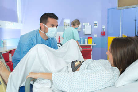 a gynecologist is examining womanの写真素材