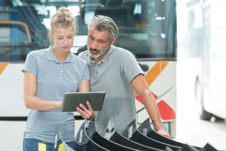 mechanics using a digital tabletの写真素材