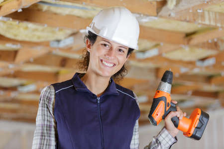 a woman doing renovation workの写真素材