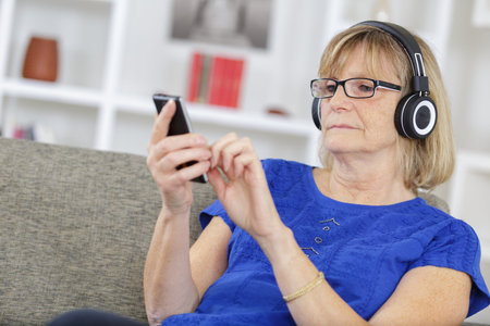 senior woman relaxing at homeの写真素材
