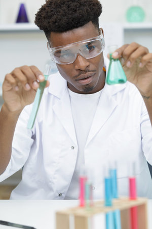 young male scientist working in the lab