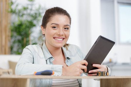 beautiful young woman with a tablet
