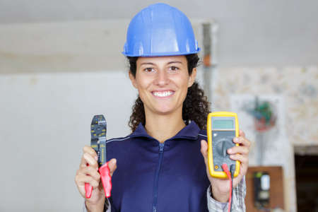 woman working with voltage measureの写真素材