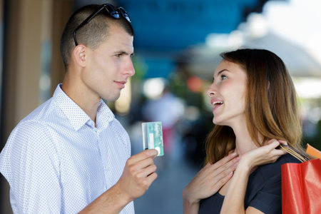 picture of couple shopping for christmas in the city