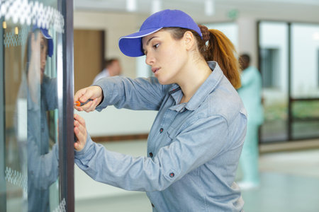 woman fixes a machine in hospital