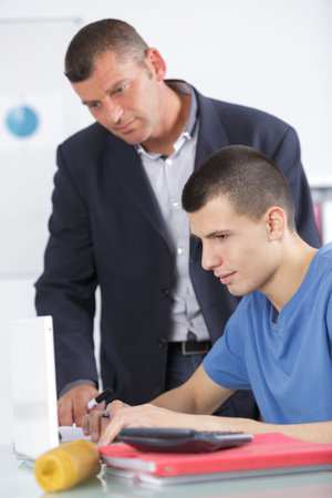 professor giving personal guidance to the student