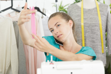young tailor woman at work
