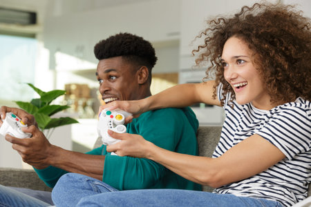excited funny friends playing video games at home