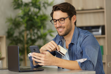 a happy man buying online