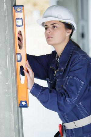 young woman worker on the building site