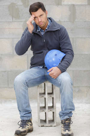 tired forehead after a long day of workの写真素材