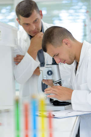 male student of chemistry working in laboratoryの写真素材