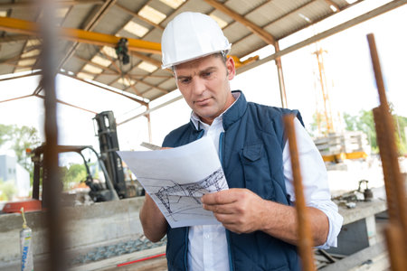 architects look at paper plan business