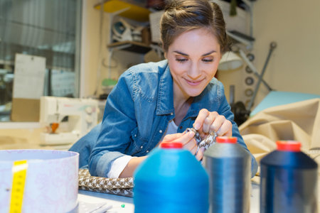 Cheerful gorgeous atelier owner