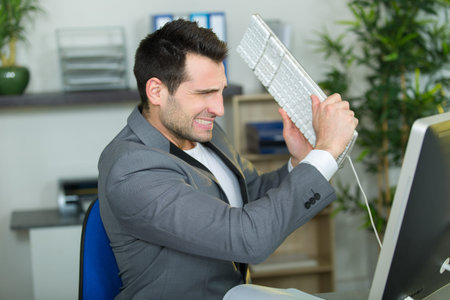 angry businessman in office
