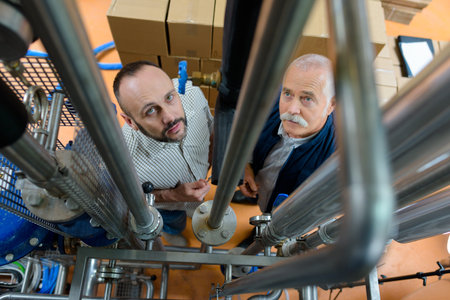 two male workers in warehouse