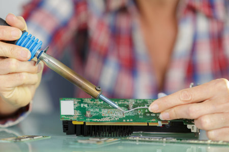 close up of a chip being soldered