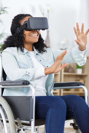 immobile woman wearing vr glassesの写真素材