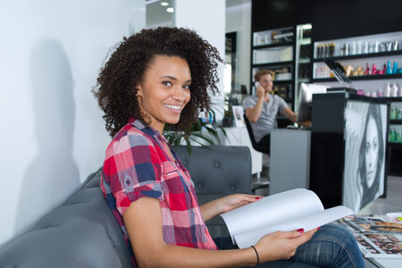 female client waiting for hairdresser