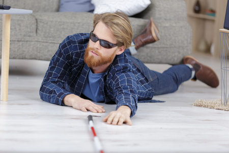 young blind man having a dangerous accident