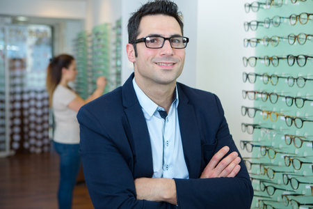 handsome male ophthalmologist in clinic
