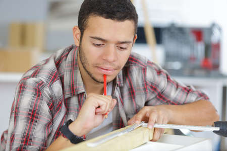 young man working in the office ocupationの写真素材