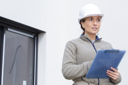 a woman architect checking list