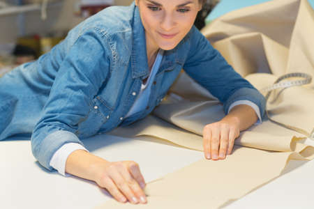 designer of fashion woman on textile material smilingの写真素材