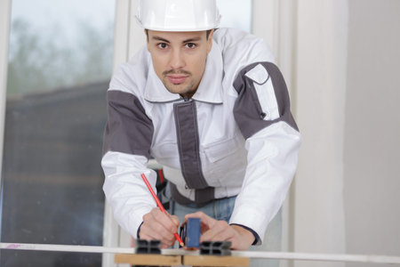 portrait of a male tradesman indoors