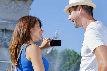 woman smiling for holiday pictureの写真素材