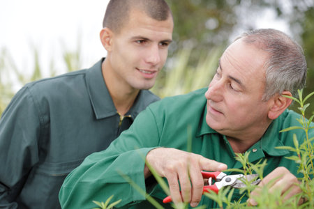 portrait of two landscape gardeners