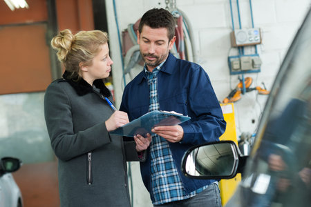 woman driver talking to insurance agent