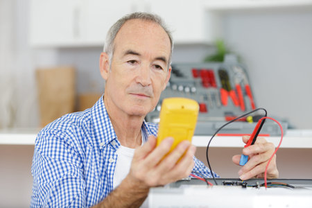 a senior electrician at workの写真素材