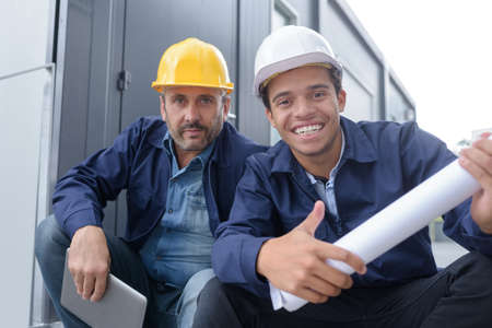 close up of a two happy men workの写真素材
