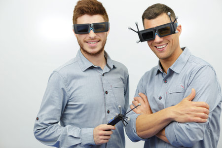 men in glasses of virtual reality plays
