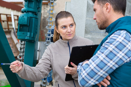 male and female workers outdoors