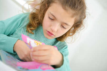 she is a creative little girlの写真素材