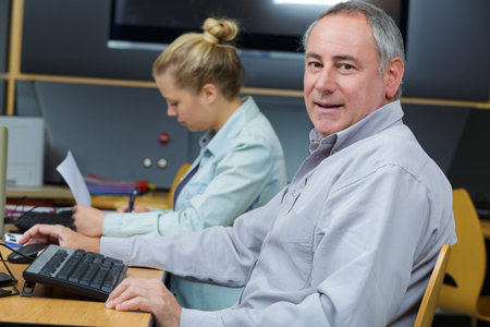 man and woman in workroom
