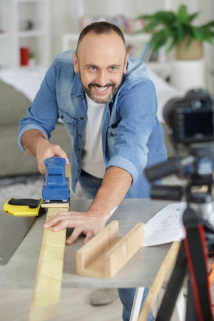 diy blogger recording video of woorworking hobby