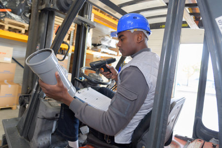 man working with a forklift in a warehouse
